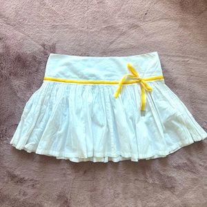 White pleated skirt